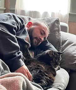 apollo laying next to his dad